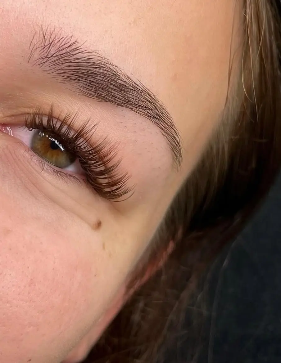 Brown eye with lash set and defined brow
